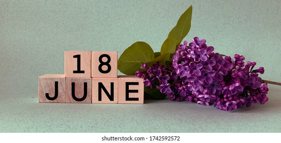 June 18.June 18 on wooden cubes .Image for the holiday .Summer day - Powered by Shutterstock