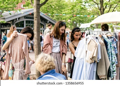 June 2018, Creative Space New Holland, Saint-Petersburg, Russia. People On The Summer Outdoor Vintage Fashion Designer Market. Garage Sale, Reuse The Clothes, Second Hand And Eco Consumer