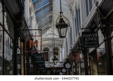 June 2019, Cardiff, Wales. People Walking Through Morgan Quarter, Shopping Arcade Started In 1896. Harvey Jones Kitchens Shop.