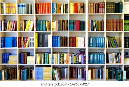                           June 2019, Russia, Moscow, bookcase, colored books arranged in cells, selective focus     