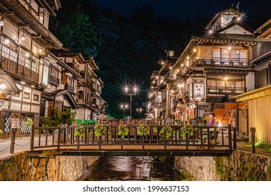 June 2021 - Yamagata, Japan: Famous Ginzan Onsen Street light up at night, hot spring town nestled in the mountains of Yamagata Prefecture. 