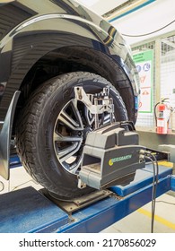 June 2022, Jakarta Indonesia, Standing Car With Sensors On Wheels For Wheel Camber Alignment Check At Service Station Workshop.