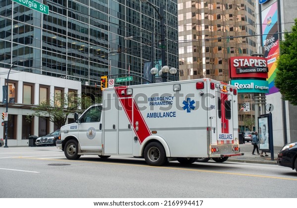 June 21\
2022- Emergency Paramedic Ambulance stop in the pedestrian cross\
walk stop light in downtown Vancouver, BC\
Canada