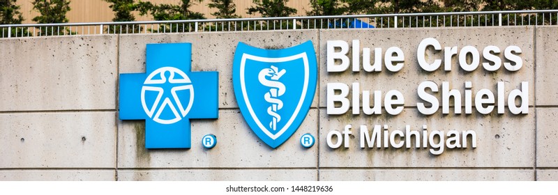 June 23, 2019. Blue Cross Blue Shield Of Michigan (BCBSM) Sign In Downtown Detroit, Michigan, USA. Panoramic Image. Selective Focus.