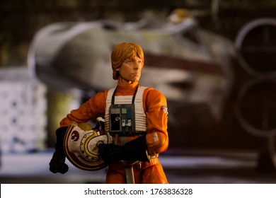 JUNE 23 2020: Scene From Star Wars With Luke Skywalker Ready To Board His X Wing Star Fighter - Hasbro Action Figure