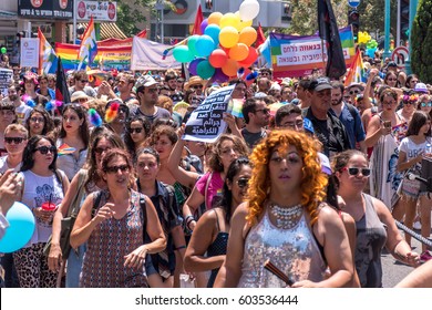 June 24, 2016 The Central Carmel. Haifa. Israel. The Parade Of Pride. Young People With Posters In Hebrew And Arabic