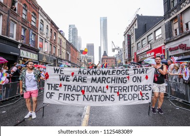 JUNE 24, 2018 - TORONTO, CANADA: Indigenous Rights Activists March At 2018 Toronto Pride Parade. 