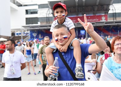 June 25, 2018. Rostov-on-Don. Russia. Little Boy Cheerleader Of The Russian National Football Team With The Flags Of The Country And Decorated Faces In The Fan Fest. FIFA World Cup.