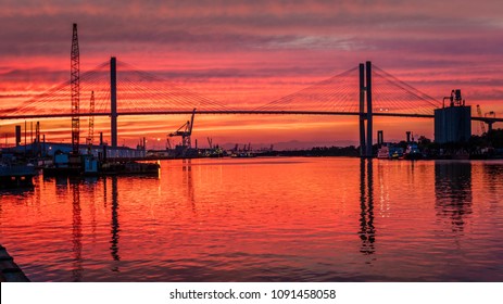 JUNE 27, 2017 - Talmadge Memorial Bridge and US 17 at sunset goes over Savannah River between Savannah Georgia and Hutchinson Island - Shutterstock ID 1091458058