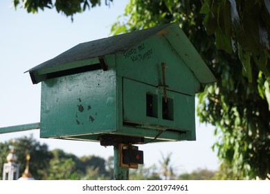 June 29, 2022. Bandung, Indonesia. An Electric Communication Device With A Design Like A Birdhouse In Green Paint Is Under A Tree