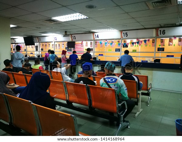 June 3, 2019 -
Shah Alam, Malaysia. Customers were waiting for their turn at
service counter Road Transport Department in MALAYSIA for required
matters. Motion blur of
people.