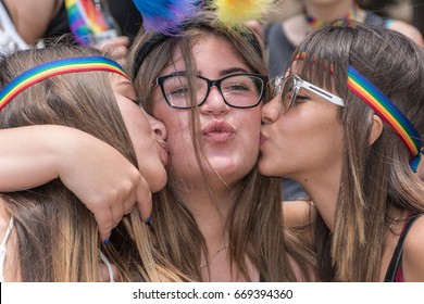 June 30, 2017. Gan HaEm Is A Public Garden In Haifa, Israel. Pride Parade And A Holiday Of Love, Organized By The LGBT Community With The Mediation Of City Authorities. Triple Kiss Of Girlfriends.