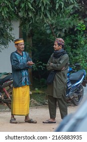 June 9, 2022, Two People Having A Discussion In The Afternoon Before Sunset In A Remote Village In East Kalimantan, Indonesia