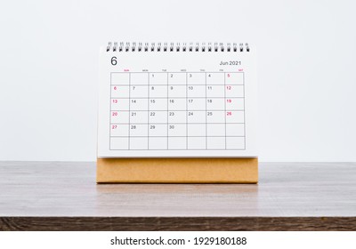 June Calendar 2021 On Wooden Table Background