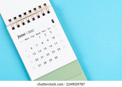 The June calendar 2022 on blue background. - Shutterstock ID 2149029787