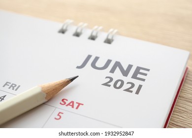 June month on 2021 calendar page with pencil business planning appointment meeting concept