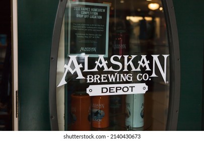 Juneau, Alaska, USA - May 22 2018: Alaska Brewing Company Depot Logo On Glass Door