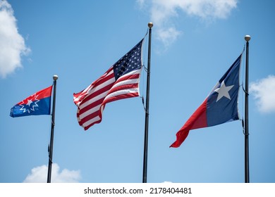 Juneteenth, USA And Texas Flags Flying. 