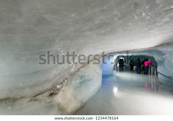 Jungfrau/Switzerland - August 26 2015:\
Ice tunnel in the Aletsch Glacier at Jungfraujoch, Switzerland.\
Jungfraujoch  is the highest railway station in\
Europe