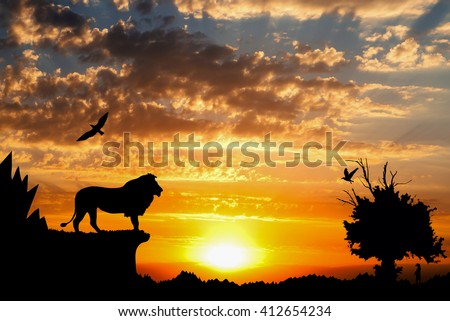 Jungle with mountains, old tree, birds lion and meerkat on golden cloudy sunset background