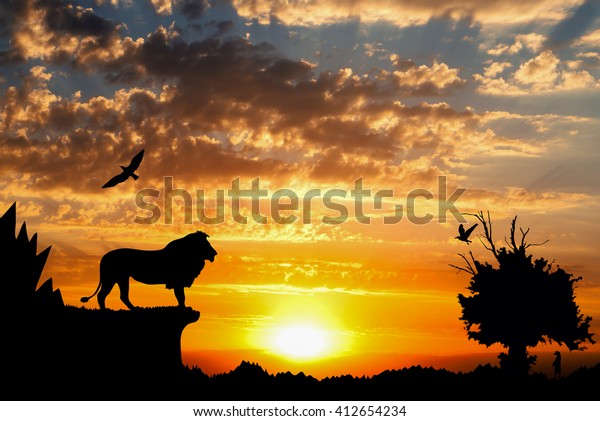 Jungle with mountains, old tree, birds lion and meerkat on golden cloudy sunset background.