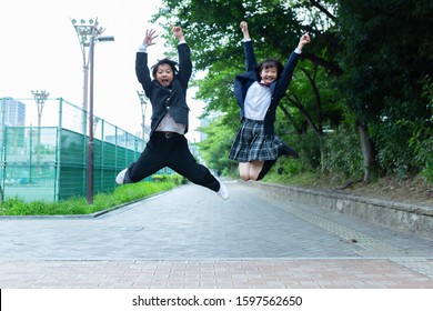 Junior High School Students Jumping