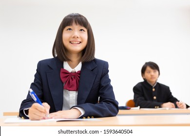 Junior High School Students Studying At A Cram School