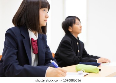 Junior High School Students Studying At A Cram School