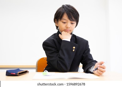 Junior High School Students Studying At A Cram School