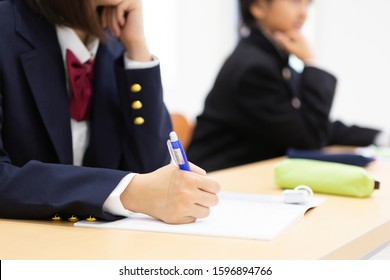 Junior High School Students Studying At A Cram School