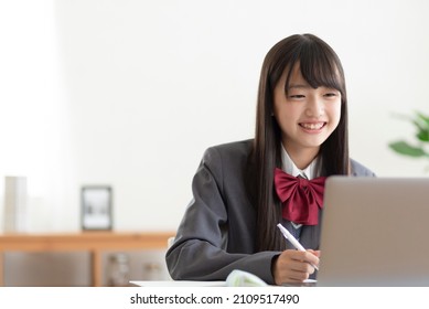 Junior high school students studying at home