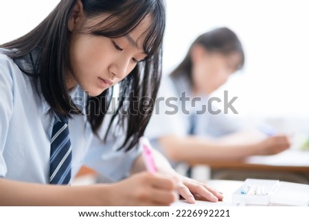 Junior high school students taking classes