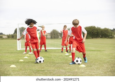 Junior Soccer Team In Training