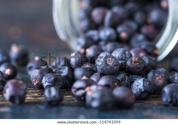 Juniper Berries Spilled\
from a Spice Jar