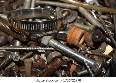 Junk Drawer Of A Tool Box Filled With Screws, Fasteners, Nails, Nuts, And Washers 