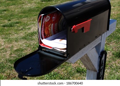 Junk Mail In Open US Residential Mailbox