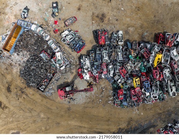 Junkyard Abandoned\
Cars Aerial View. Top Down View. Vehicle Demolition. Car Dump.\
Industrial Aerial Background.\
