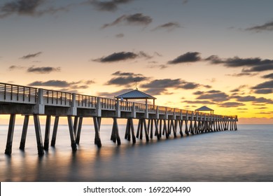 Juno, Florida, USA At The Juno Beach Pier During Sunrise.