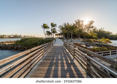 "Jupiter, FL USA 2-3-21: Sunrise view over the bridge at Jupiter Beach Park."