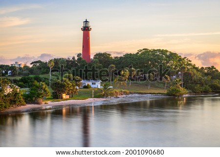 Jupiter, Florida, USA and inlet lighthouse at dawn.