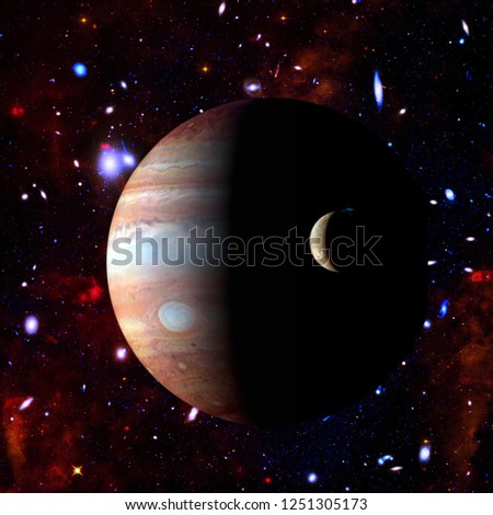 Jupiter and its moon. The elements of this image furnished by NASA.
