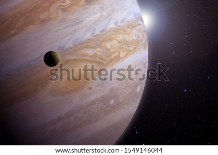 Jupiter with the satellite. Elements of this image were furnished by NASA.