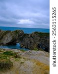 Jurassic coast view in Dorset. Cold winter day. Lulworth Cove cliffs view on a way to Durdle Door. The Jurassic Coast is a World Heritage Site on the English Channel coast. Stair Hole view