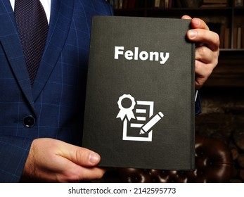  Juridical concept about Felony with phrase on the page. - Shutterstock ID 2142595773