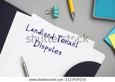 Juridical concept about Landlord Tenant Disputes with phrase on the piece of paper.
