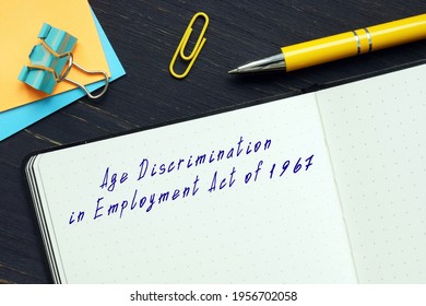  Juridical concept meaning Age Discrimination in Employment Act of 1967 with a sign on the page.
