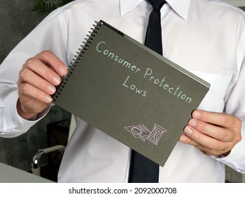  Juridical Concept Meaning Consumer Protection Laws With Inscription On The Piece Of Paper.
