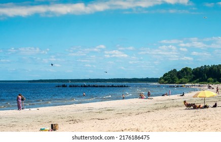 Jurmala, Latvia - July 03, 2022: Sunny Day On Sandy Beach Of The Baltic Sea In Jurmala - Famous Tourist Resort In Latvia