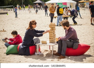 Jurmala Resort City At Majori Beach / Latvia - May, 2019: Family Playing Giant Jenga Game By The Beach During Jurmala Resort Festival