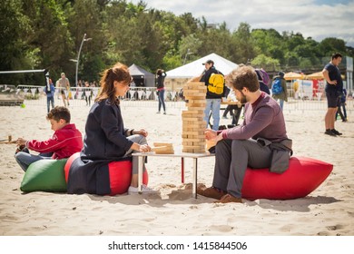 Jurmala Resort City At Majori Beach / Latvia - May, 2019: Family Playing Giant Jenga Game By The Beach During Jurmala Resort Festival